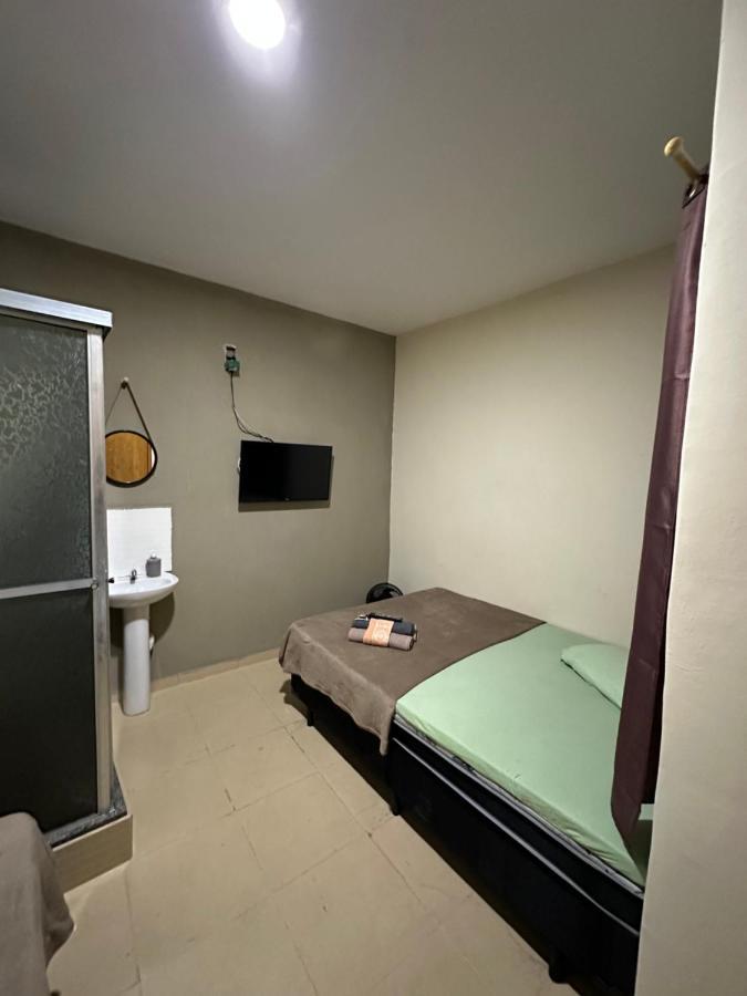 Pousada Casa Da Fe Hotel อาปาเรซีดา ภายนอก รูปภาพ